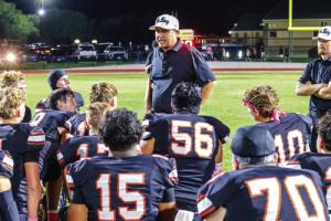 Schulenburg’s interim head football coach, Marty Bigham, speaks to the team after Friday’s loss. Photo by Andy Behlen