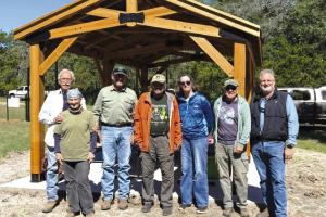 The clean up group from the Pin Oak Cemetery in front of the new pavilion.