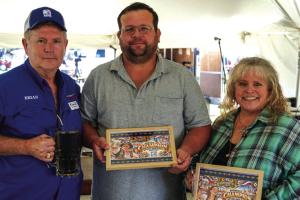 Winners of the stein holding competition at the Texas Czech Heritage and Cultural Center’s Heritage Fest in La Grange on Saturday, sponsored by the SPJST, were Adam Cernosek of La Grange (center) in the men’s division and Theresa Greenwell of Lake Jackson in the women’s division. They are pictured with SPJST President Brian Vanicek. Photos by Andy Behlen