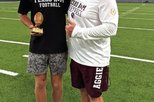 La Grange High School senior-to-be Colt Jobb attended the Texas A&amp;M Football Specialist Camp on Sunday, May 31. He was the Punt Champion for the camp. His longest punt was 59 yards. He is pictured above with Coach Patrick Dougherty, the Special Teams Coordinator for Texas A&amp;M Football.