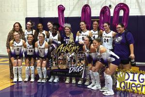 La Grange’s Ashtyn Smith celebrates her 1,000th career dig with her teammates after Friday’s victory over Sealy. LGISD photo