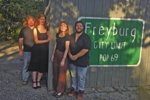 The stars of the play ‘Now and Then’ outside Freyburg Hall. Left to right: Brandon Theut, Melanie Lira, Emily Hudson and Austin Williams. Photo by Heather Barthelme