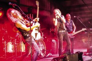 The 80s rock cover band LC Rocks got the party started Friday night at the Festival. Photo by Andy Behlen