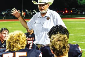 Schulenburg football coach Clay Ferguson talks to his players after a game last season, Ferguson’s first during which the Shorthorns went 6-6. Friday the school announced that Ferguson was being relieved of his head coaching and athletic director duties. Photo by Andy Behlen