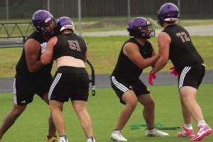 La Grange linemen go through drills Tuesday morning at Leopard Stadium. Photos by Jeff Wick