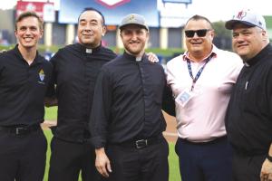 Fr. Brian Phillips, the former priest at Sacred Heart in La Grange and now at St. Margaret Mary Catholic Church, threw out the first pitch at the Round Rock Express minor league baseball game Friday as Catholics from across the Diocese of Austin gathered for an evening of baseball, fellowship, and fun.
