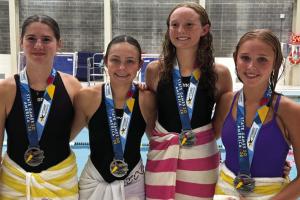 The 15-16 Girls relay team of CC Bartek, Makenna Emmel, Lyria Hartley, and Adysen Janacek earned two trips to the podium, capturing 2nd place in the 200-yard Medley Relay (2:20.91) and 3rd place in the 200-yard Freestyle Relay (2:02.52).