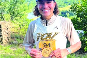 Aaron Albert of Houston won the Spasslauf 5K that kicked off the Schuetzenfest festivities May 16 in La Grange. This was his first time running in the La Grange race. He ran the challenging course, which started at the KC Hall in La Grange and then went past the Colorado River, Bucker’s Creek and around the golf course before going up the bluff, in a time of 17:16. Photo by Jeff Wick