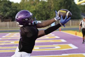 La Grange’s Dillan Johnson reaches out to haul in this touchdown pass during Thursday’s preseason scrimmage against Franklin at Leopard Stadium. Photo by Darrell D. Gest