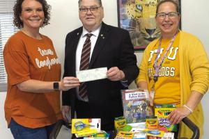 The Lafayette Lodge recently held an event on the La Grange Square on the first Saturday in August and asked the community to donate school supplies or make a cash donation to the event. Above, Jackie Skelton with Lafayette Lodge presented the monetary donation and items collected to La Grange Elementary Principal Dr. Regina Walker (left) and La Grange Elementary Librarian Amy McCord (right). Photos from the event below.