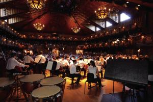 Young musicians prepare for concert on the Festival Institute stage.