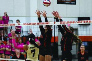 Schulenburg’s Kimber Bartosch, left, and Greenli Van Zandt, right, jump to block this hit by Danbury Friday. Photo by Audrey Kristynik