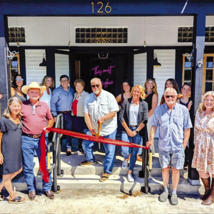 The Greater Fayetteville Chamber of Commerce held a ribbon cutting Friday, Oct. 10 for SCM Designs one O three.
