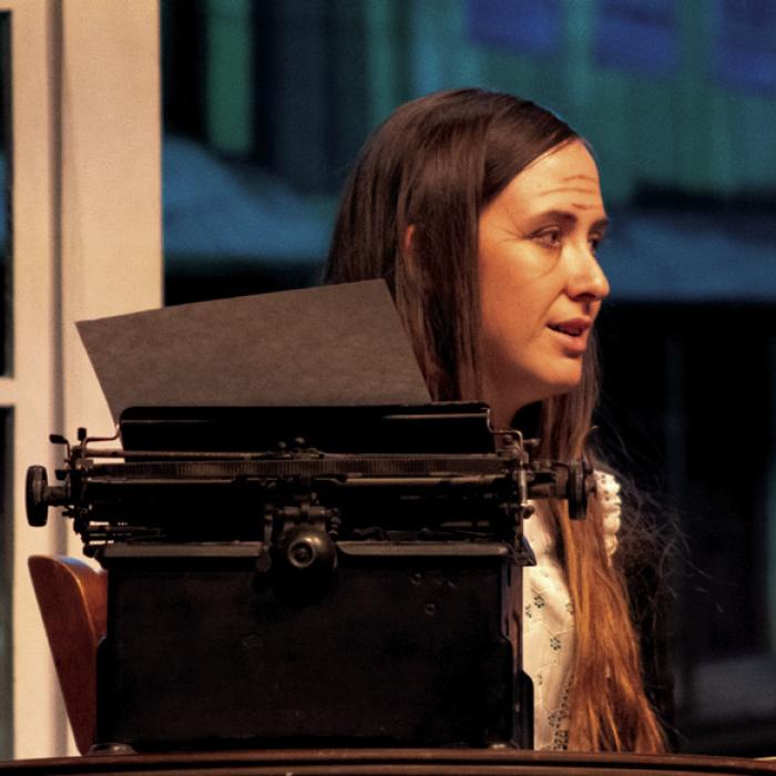 Zoe Janda, shown here at her typewriter, played Widder Maisey, a very unique newspaper woman. Photos by Meadow Taylor-Marklin