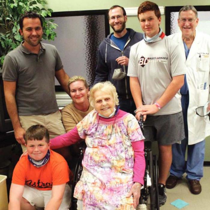 La Grange’s Josephine (Jo) White smiles surrounded by family members on her 100th birthday Monday. Next to her is great-grandson Shepherd, back row, left to right is Seth Gunn, husband of her granddaughter Mary, kneeling, grandson Scottson White, great-grandson Oliver Gunn and her son Dr. Daniel White. Photos by Jeff Wick