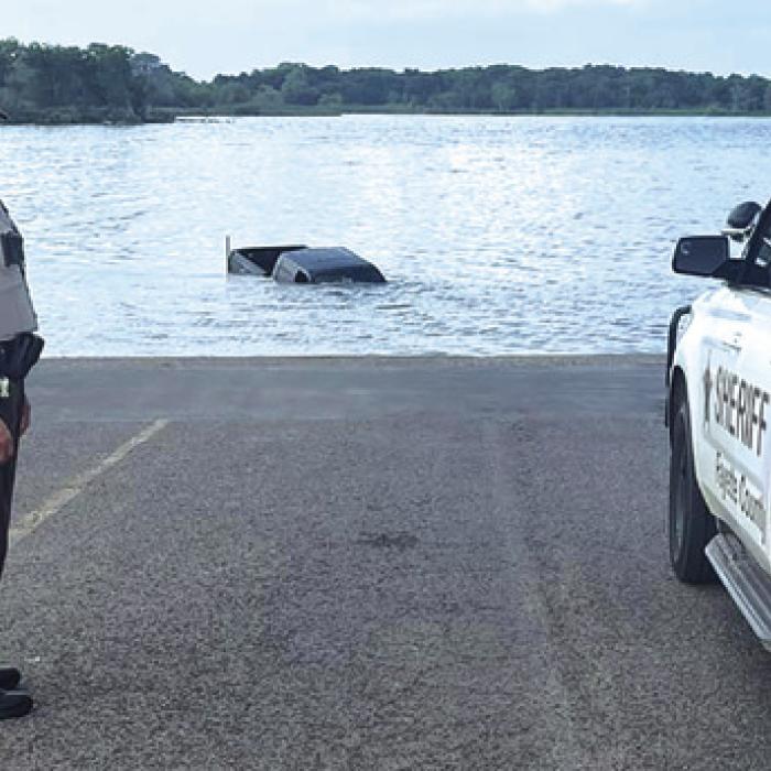 Man Swims to Safety After Truck Rolls into Lake