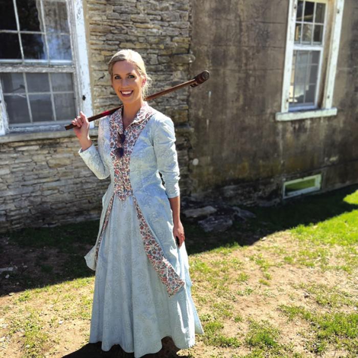 Volunteer Andrea Polasek prepares for the next round of croquet in front of the Kreische House. Join the sites for their first program on March 8, titled “Crochet, croquet, and croquettes” and learn the difference between the three activities.
