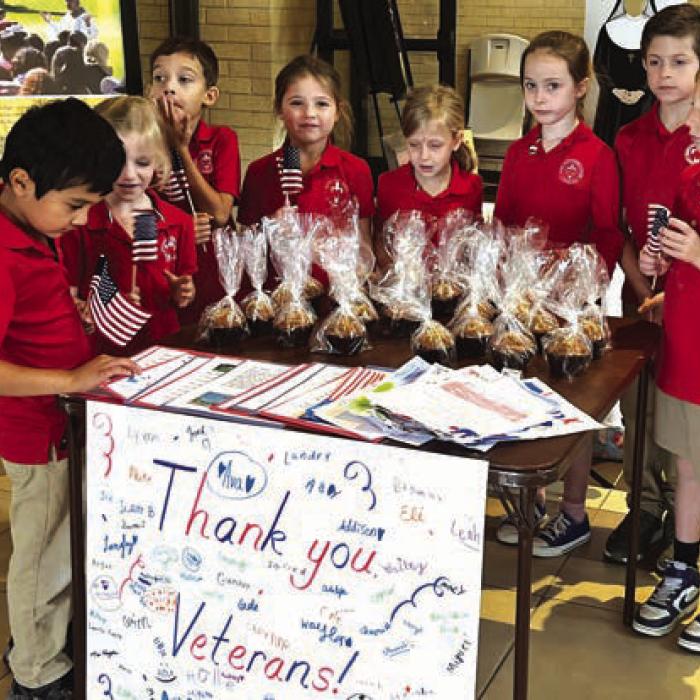 Sacred Heart Catholic School honored our veterans at our weekly school Mass and presented them with thank you cards and muffins afterward. “Thank you all veterans for their selfless service to our country!” said principal LaDonna Voelkel.