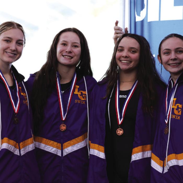 Medley relay at district, left to right: Hope Michalke, Eleanor Carey, Celeine Fabre, Adysen Janacek.