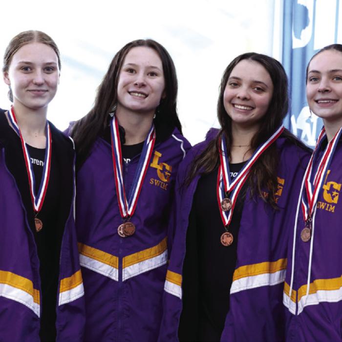 Girls 200 freestyle relay at district, left to right: Paige Michalke, Eleanor Carey, Celeine Fabre, Adysen Janacek.