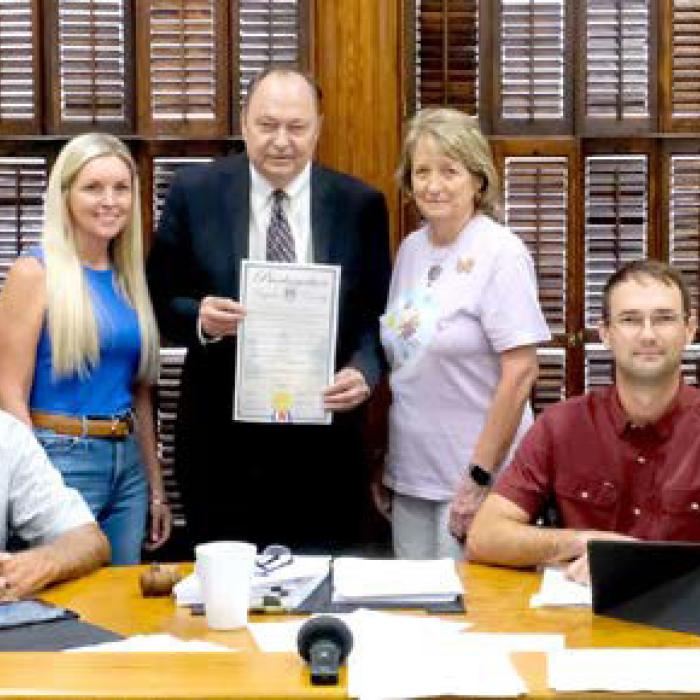 September Proclaimed Childhood Cancer Awareness Month/ Gold Ribbon Placed on Oak