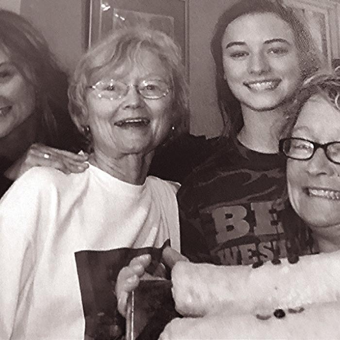 The family gets together to roll out apple strudels, a long-time Czech holiday favorite. Pictured (left to right) are: daughter Dana Wells, Virginia, granddaughter Allie Wills and daughter Kelly McGill.
