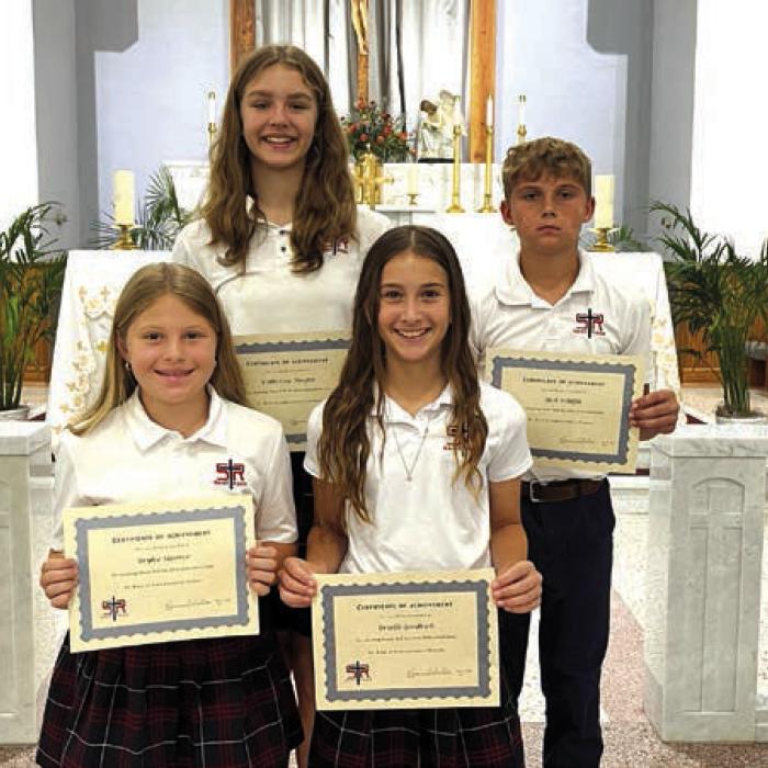 5th Grade Honor Roll for the 2024-2025 school year: (front, form left) Brylee Stoever and Brielle Goedrich; (back) Catherine Hooper, Jack Schiffli.