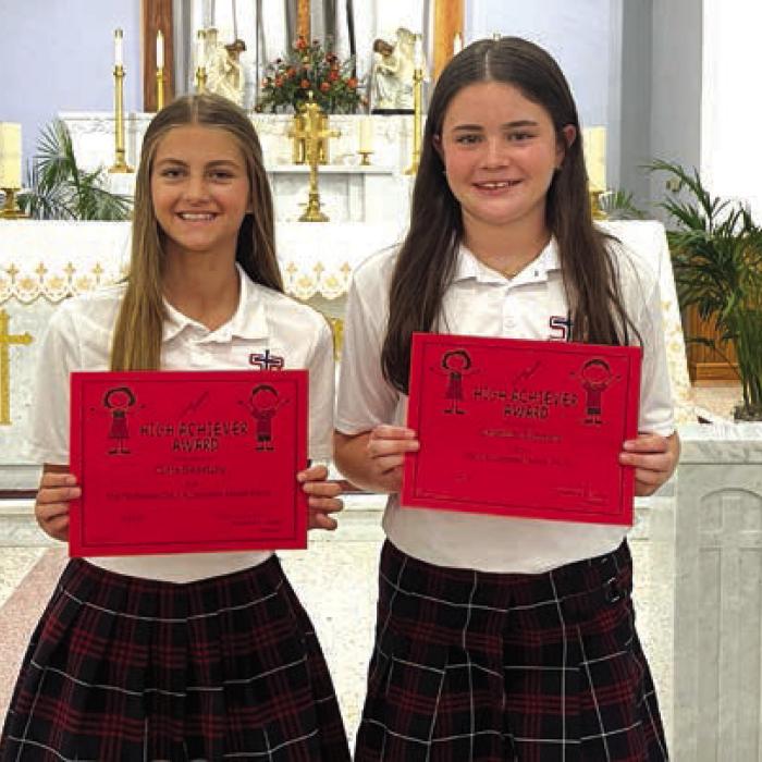 7th Grade Accelerated Readers: Clare Besetzny and Charlotte Schmidt.