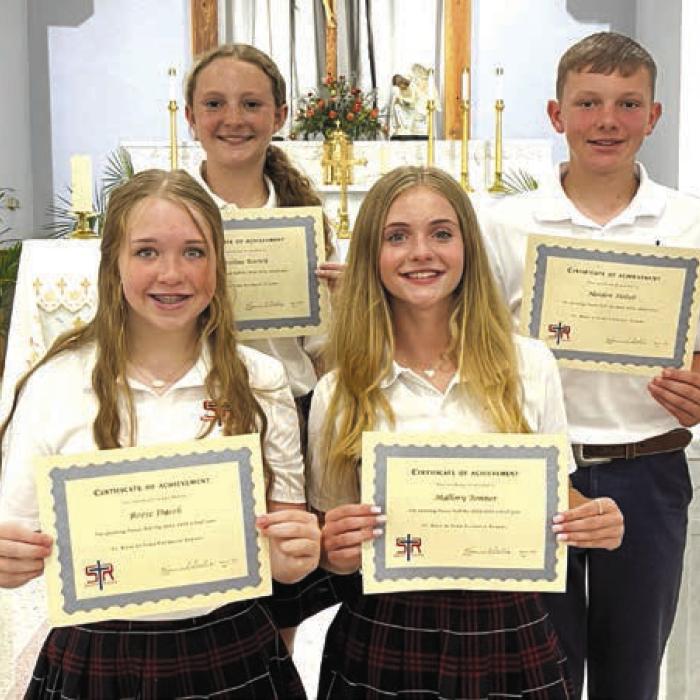 8th Grade Honor Roll for the 2024-2025 school year: (front, from left) Reese Dusek, Mallory Bonner; (back) Caroline Bartek, Holden Holub.