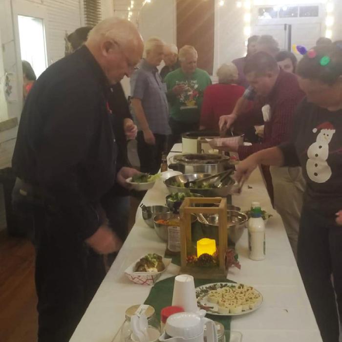 Baked potato bar set up for Winchester Community Christmas Party.