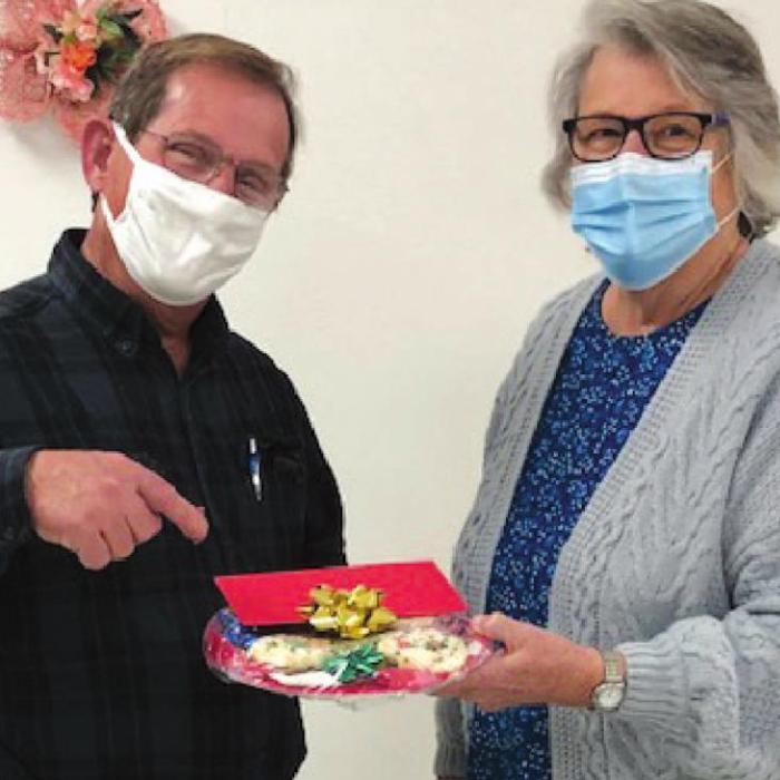 Tom Muras was recognized for his service on the NVCC Board of Directors by Glenda Stavinoha.