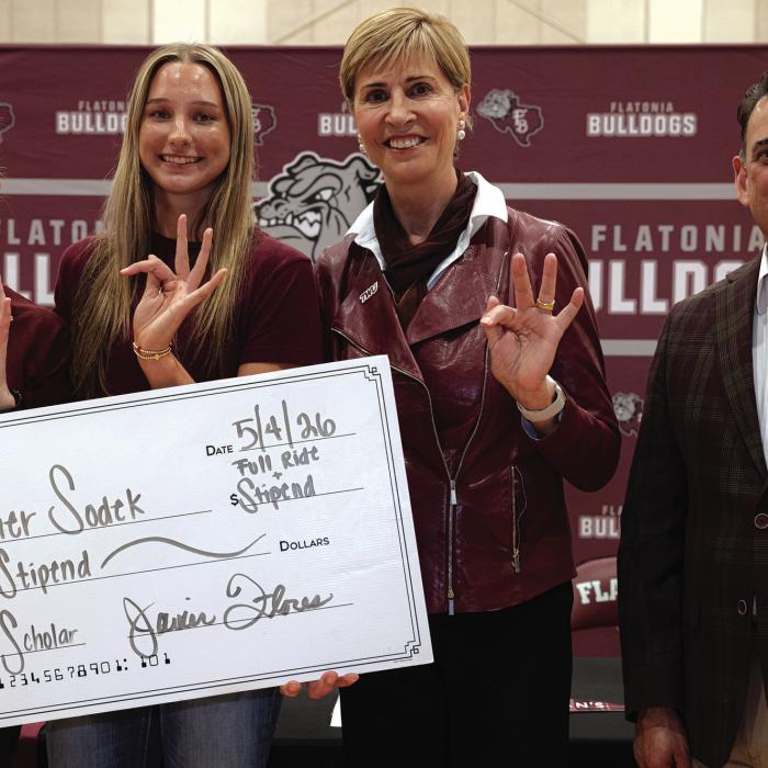 From left to right: Texas Woman’s University Basketball Head Coach Beth Jillson, Flatonia HS senior Summer Sodek, TWU Chancellor Carine Feyten, and TWU VP for Enrollment Management Javier Flores.