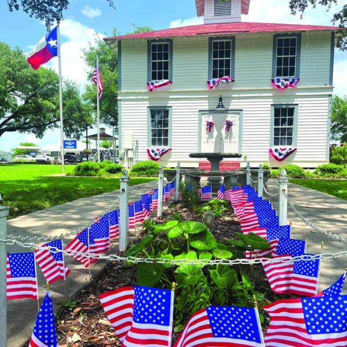 The Round Top courthouse grounds are all decked out in red, white and blue for Memorial Day weekend. Photo by Jeff Wick