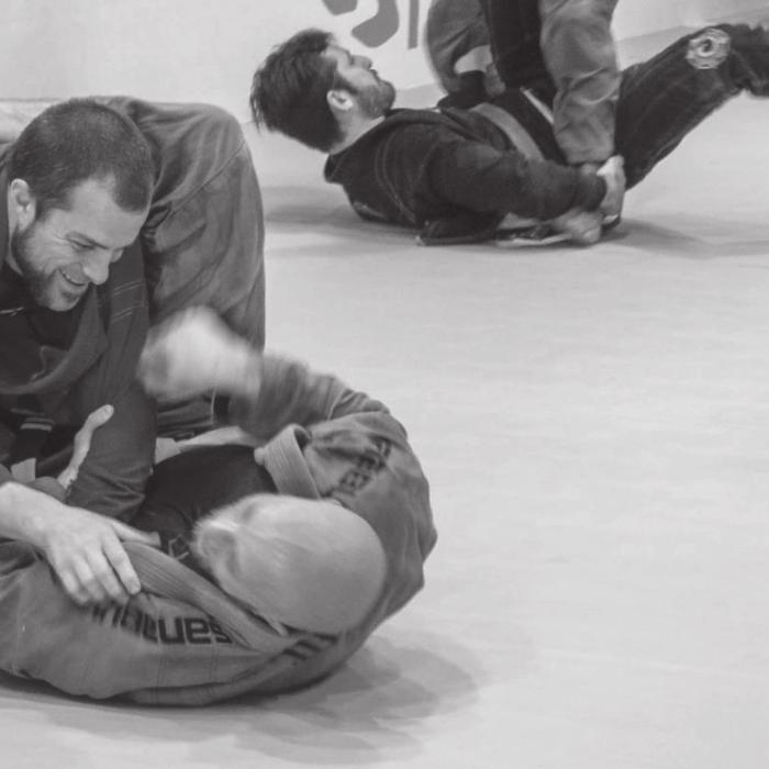A snapshot of the action being showcased during the Brazilian Jiu Jitsu studio’s grand opening in La Grange three weeks ago. Photo by Andy Behlen