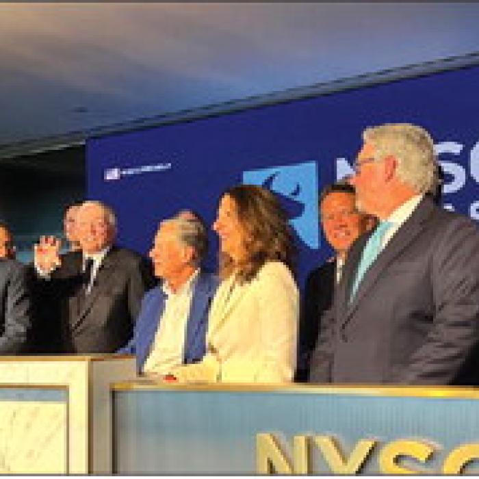 Wayne Penello, founder and CEO of Columbus-based NextGen EMP, far right in cowboy hat, joins New York Stock Exchange President Lynn Martin, Texas Governor Greg Abbott and other business and government leaders on the podium for the August 27 grand opening of NYSE Texas in Dallas. Abbott rang the NYSE Closing Bell to mark the occasion.