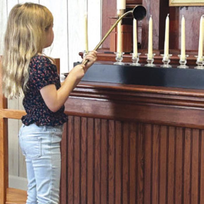 Lily Kindsvatter lit the candles in remembrance of those that passed in the last year from Shared Lutheran Ministry. St. John in Ellinger hosted the service and brunch afterwards on Sunday, Nov. 3.