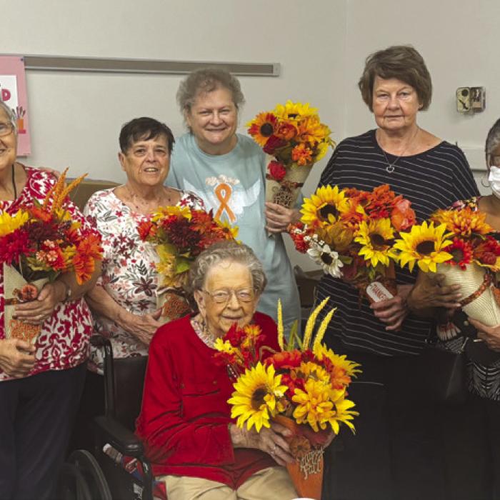 Artful Friday participants in Martha Beckmann’s Holiday Decorations Workshop pictured from left: Cheri Wilson, Cynthia Meyer, Julie Hill, Kathy Besetsny, Delores Bittner, Janice Collins, Martha Beckmann, and Irene Janda in front.
