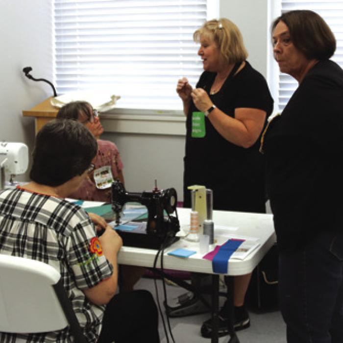 Glenda Wilder’s instructing at the “Quilting Around the World” Presentation on Tuesday, Aug. 22.