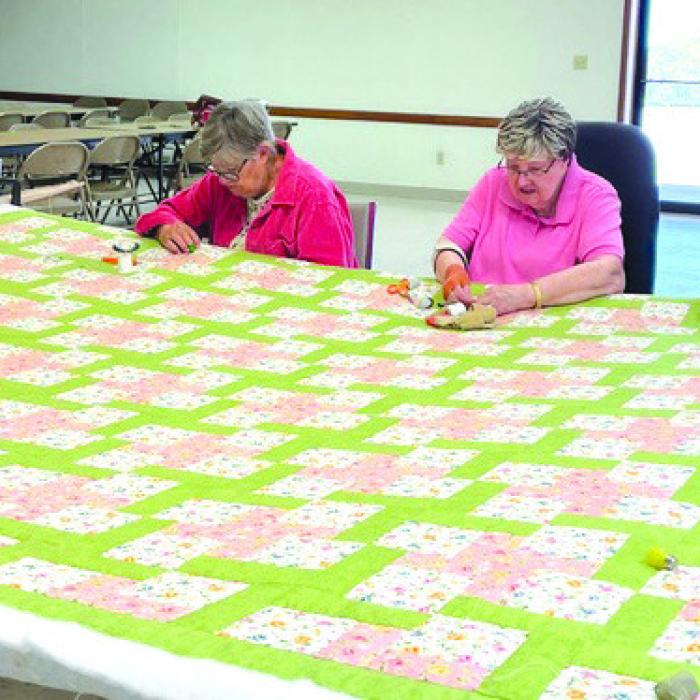 Ladies of St. John and St. Mary quilting for St. John Altar Society pictured from left: Joann Tobias, Lenora Zapalac, Rosemary Ermis and Gladys Polasek.