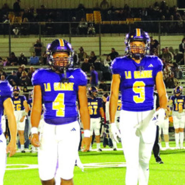 The La Grange captains walk out for the coin toss before Friday’s game. Photo by Darrell D. Gest