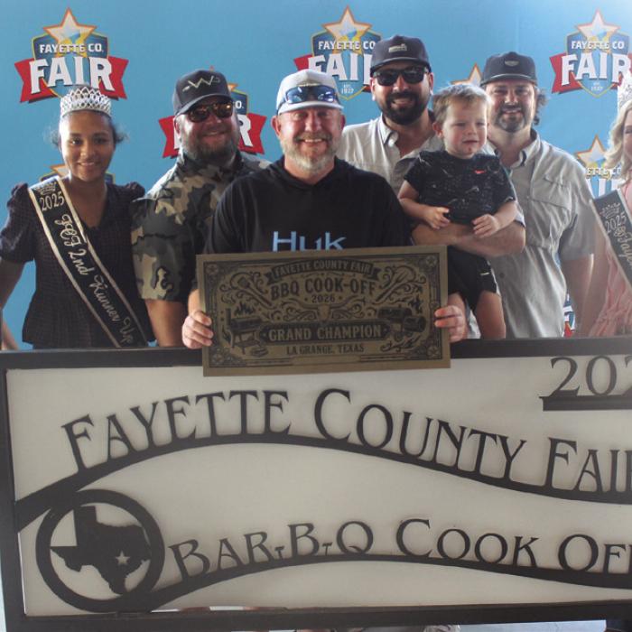 The team of Silver Bullet Cookers won Grand Champion at Saturday’s Fayette County Fair Bar-B-Q Cook Off. Left to right: Jr. Miss Fayette County Anabelle Zwahr, 2025 Queen second runnerup Keanna Henderson, Anthony Wessels, Trevor Erickson, head cook Brock Otto, Brant Otto, Charles Otto and 2025 Fair Queen Hailey Janish. Photos by Jeff Wick
