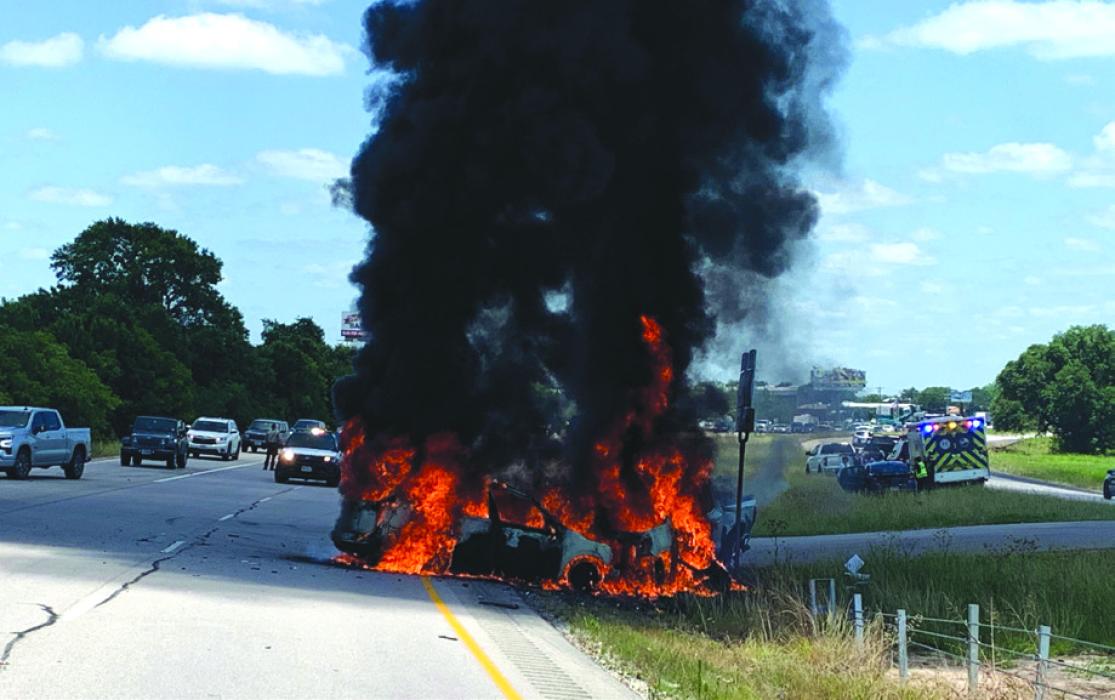 Two vehicles burst into flames after a wreck at the intersection of State Hwy. 71 and Loop 220 in Plum on Sunday. There were no serious injuries reported. On Tuesday, a rollover crash near the same spot left the driver seriously injured. Photo courtesy of La Grange Fire Department