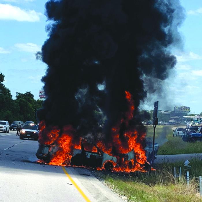 Two vehicles burst into flames after a wreck at the intersection of State Hwy. 71 and Loop 220 in Plum on Sunday. There were no serious injuries reported. On Tuesday, a rollover crash near the same spot left the driver seriously injured. Photo courtesy of La Grange Fire Department