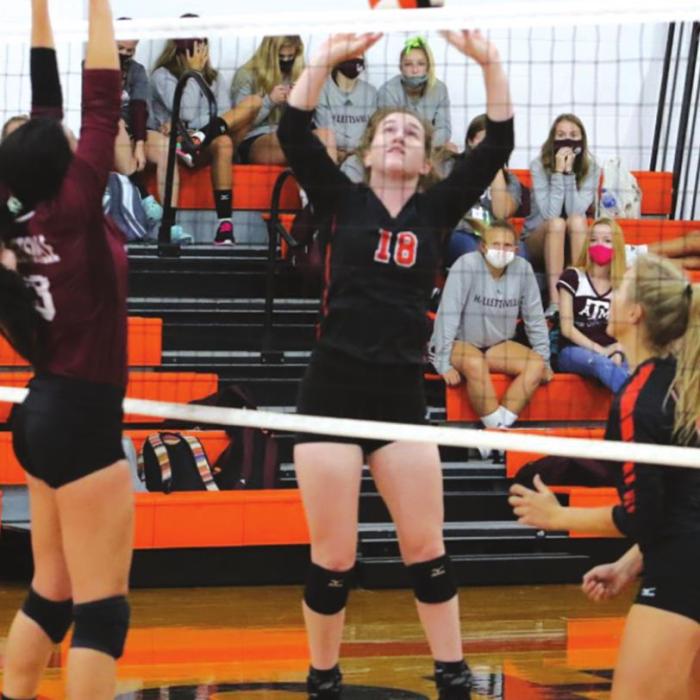 Schulenburg’s Morgan Marburger sets a ball in Friday’s match against Hallettsville. The Lady Horns play in La Grange Friday. Photo by Audrey Kristynik