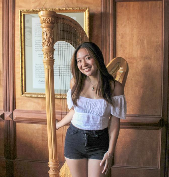 Naomi Sun, a harpist from Rice University, is one of the talented musicians studying at Festival Hill. Photo by MaKenzie Givan