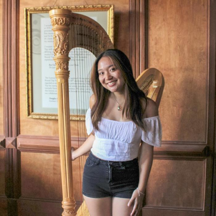 Naomi Sun, a harpist from Rice University, is one of the talented musicians studying at Festival Hill. Photo by MaKenzie Givan