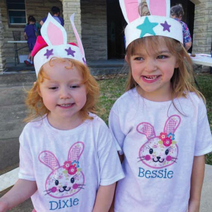 The Sassin girls, Dixie and Bessie, modeling their bunny ears.