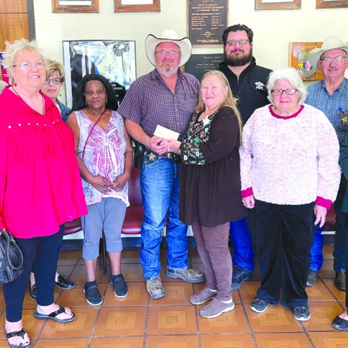 The Walhalla Extension Education Club members recently donated to Fayette County’s Deputy Santa Fund. Shown in the photo are Walhalla Club members and personnel from the Fayette County Sheriff’s Department. From left to right: Deputy Jared Michalec, Vivian Krenek, Sally Garrett, Shirley Davis, Lt. David Beyer, Donna Burton, Investigator Jeremy Castleberry, Helen Wagner, Chief Deputy Randy Noviskie, and Lila Garlin.
