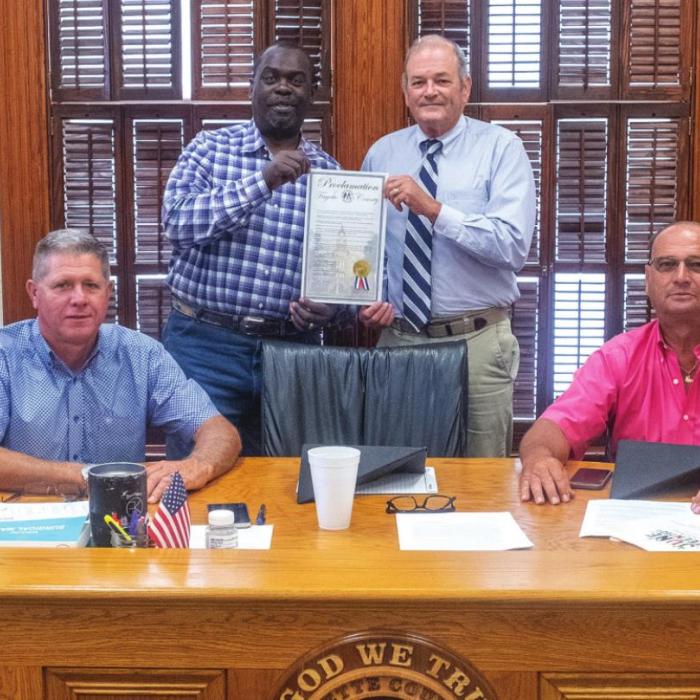 Fayette County Commissioners Court signed a proclamation last Thursday designating June 19 as Emancipation Day in Fayette County. On hand for the signing was Jonathan Ellis, president of the La Grange Juneteenth Committee. Pictured are (from left) Pct. 4 Commissioner Drew Brossmann, Pct. 3 Commissioner Harvey Berckenhoff, Ellis, County Judge Joe Weber, Pct. 2 Commissioner Luke Sternadel and Pct. 1 Commissioner Jason McBroom. Photo by Andy Behlen