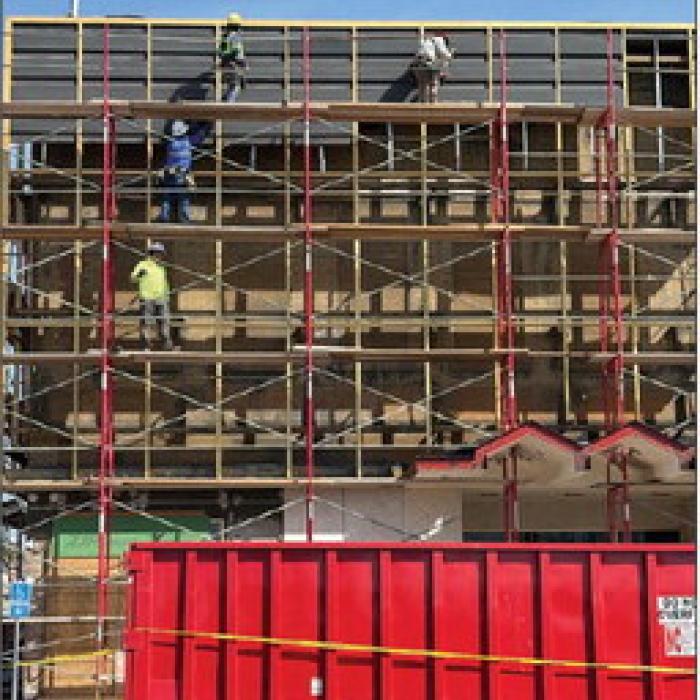 Last week workers removed the metal and marble facade that has covered the old brick for about a half century.